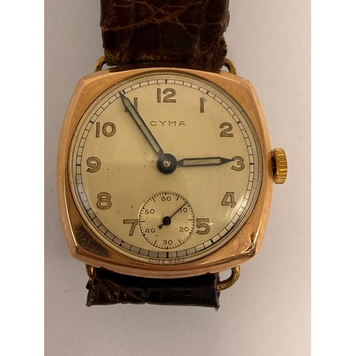  A gent's 9 carat gold-cased leather strap wristwatch, the circular dial signed CYMA, with luminous A... 