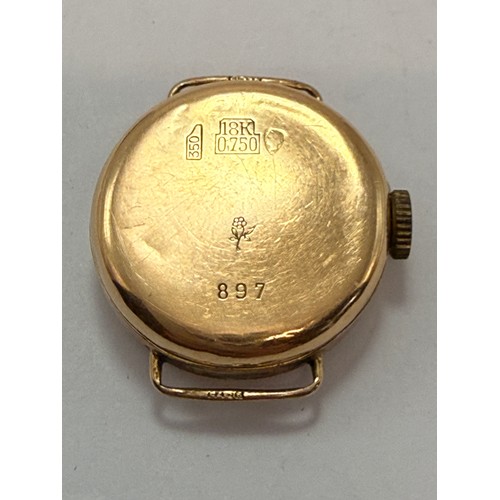  A 9 carat gold watch head, the circular white enamel dial with Arabic numerals and blued steel hands... 