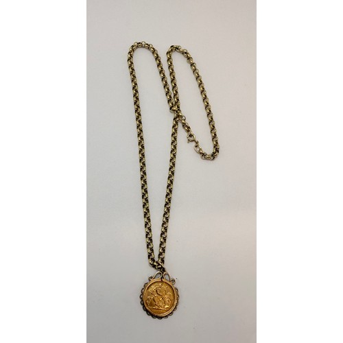 634 - A George V half sovereign, 1915, to a 9 carat gold loose pendant mount hallmarked London 1971, on a ... 