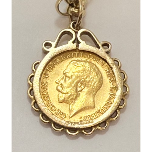 634 - A George V half sovereign, 1915, to a 9 carat gold loose pendant mount hallmarked London 1971, on a ... 