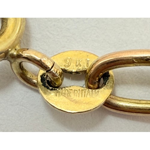 634 - A George V half sovereign, 1915, to a 9 carat gold loose pendant mount hallmarked London 1971, on a ... 
