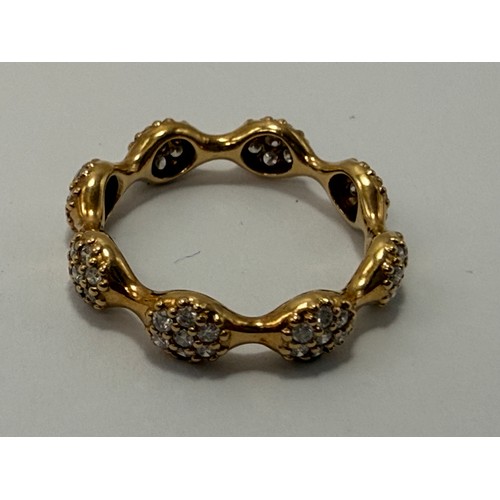  Three 18 carat gold Pandora stacking rings, one a cluster eternity ring, the other two plain bands, ... 