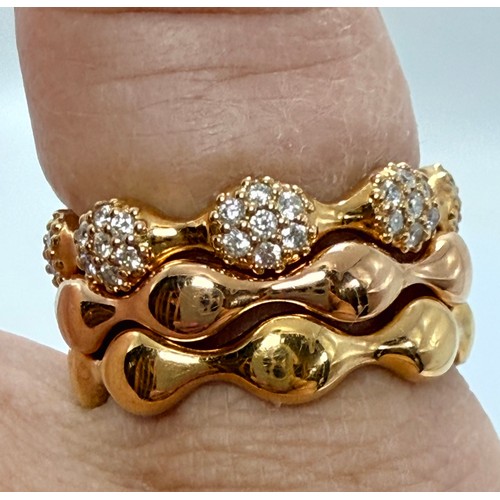  Three 18 carat gold Pandora stacking rings, one a cluster eternity ring, the other two plain bands, ... 