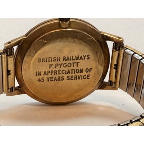  A gent's 9 carat gold-cased Smiths Astral wristwatch, the white circular dial with gilt metal Arabic... 