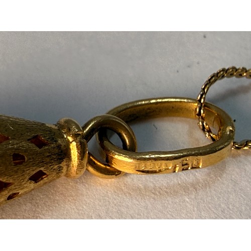640 - A pearl pendant with textured and pierced conical gold mount to a fine flat s-link chain, both stamp... 