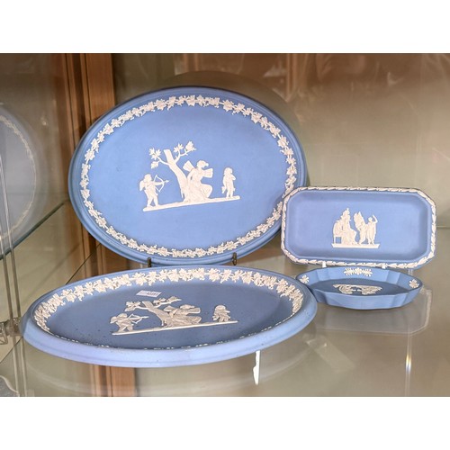 191 - A Collection of four pieces of Wedgwood blue jasperware plates