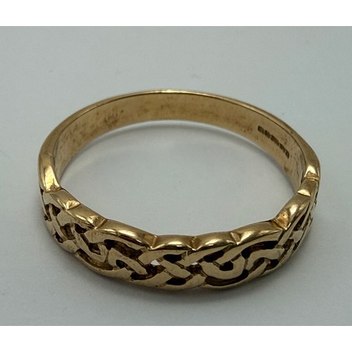  A 9 carat gold signet ring, the rectangular matrix engraved with foliage and initials, to stepped sh... 