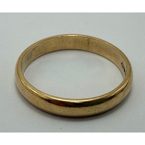  A 9 carat gold signet ring, the rectangular matrix engraved with foliage and initials, to stepped sh... 