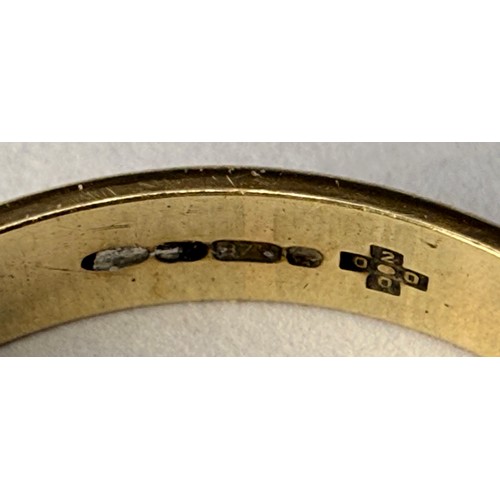  A 9 carat gold signet ring, the rectangular matrix engraved with foliage and initials, to stepped sh... 