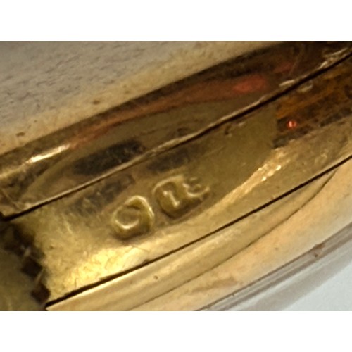  An 18 carat gold-cased lady's wristwatch, the champagne circular dial signed Lanco 15 JEWELS, with g... 