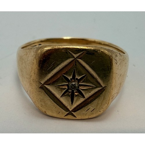  A gent's 9 carat gold solitaire signet ring, the cushion-shaped matrix gypsy-set with a small diamon... 