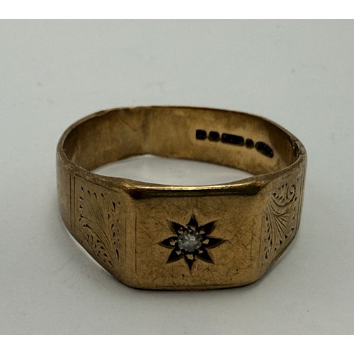  A gent's 9 carat gold solitaire signet ring, the cushion-shaped matrix gypsy-set with a small diamon... 