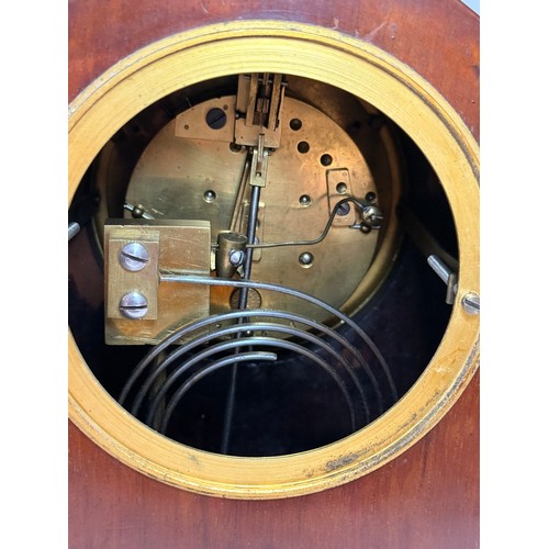 25 - An inlaid Edwardian Mahogany Mantel clock