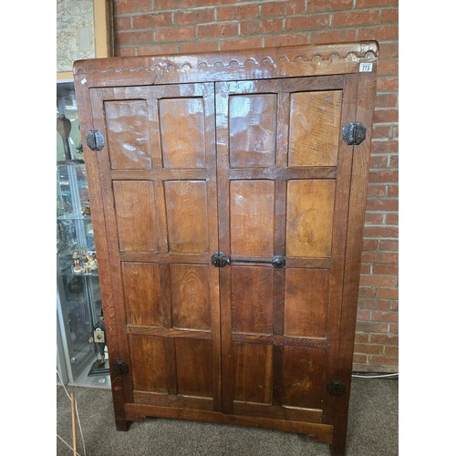 A very rare early Robert Thompson Mouseman English Oak Panelled Double Wardrobe with signature mouse carved into left hand side. One single hanging rail and shoe rail inside. H167cm x W108cm x D57.5cm