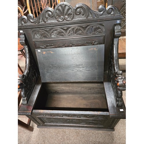 805 - A Jacobian style antique carved Monk's Bench with hinged seat 83cm wide x 45cm deep x 103cm high
