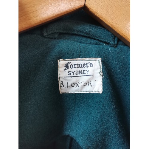 128 - Australian Test Cricket interest: An Australian cricket blazer, green wool with gold ribbon edging, ... 