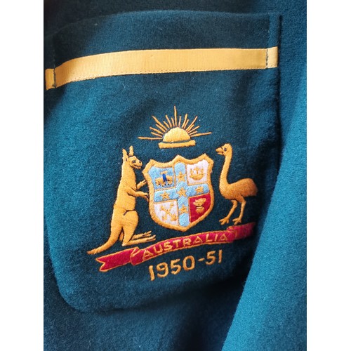 128 - Australian Test Cricket interest: An Australian cricket blazer, green wool with gold ribbon edging, ... 