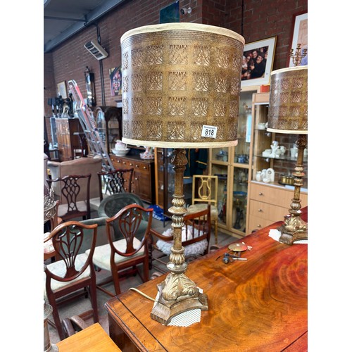 818 - A pair of gilt composite table lamps with pierced metal shades 75.5cm high

Good: In good condition ... 