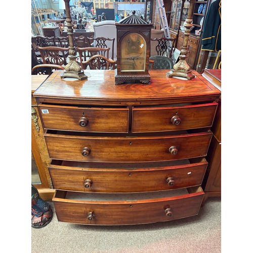 820 - A 19th century mahogany bow fronted chest of drawers comprising two short over three long oak lined ... 
