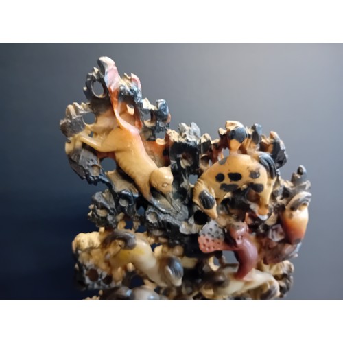 40 - A Hand carved chinese Soapstone Sculpture depicting multiple different animals H42cm x W23cm