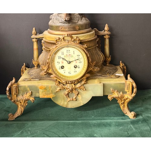4 - French Belle Epoque mantel clock.  Featuring a painted bronze or spelter figurine holding flowers, o... 
