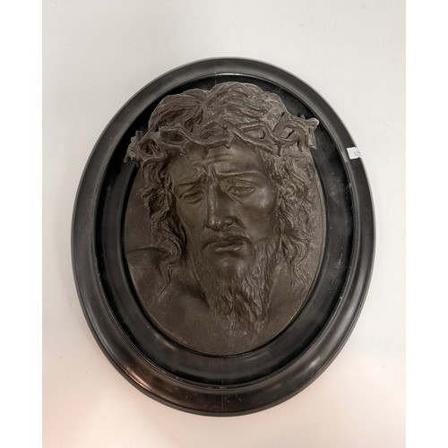 5 - A pair of bronze relief plaques.  One depicting Jesus Christ with a crown of thorns.  The other plaq... 