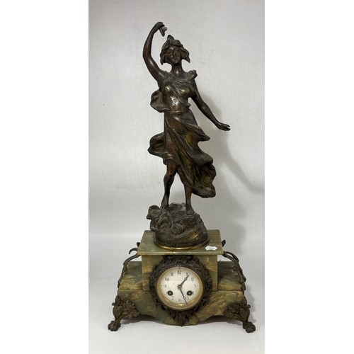 21 - French Art Nouveau Mantel Clock and Garniture set.  The bronze depicting 