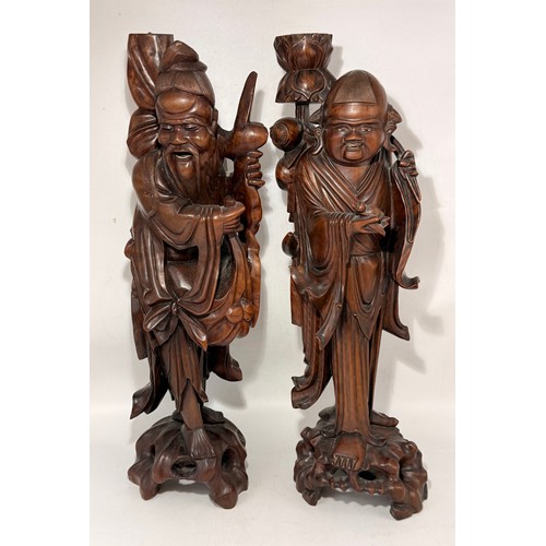 25 - Two ornate hardwood statues of Chinese deities.  The First being Shou Xing, Chinese god of longevity... 