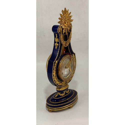 31 - Franklin Mint Victoria and Albert V&A museum 'Marie Antoinette Mantel Clock' of lyre form.  Cobalt b... 