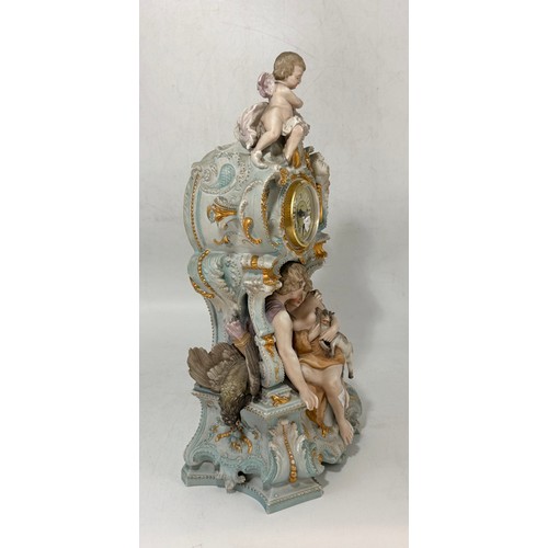 32 - Continental porcelain mantel clock.  Rococo style gilded details and figural sculptures.  Mercedes c... 