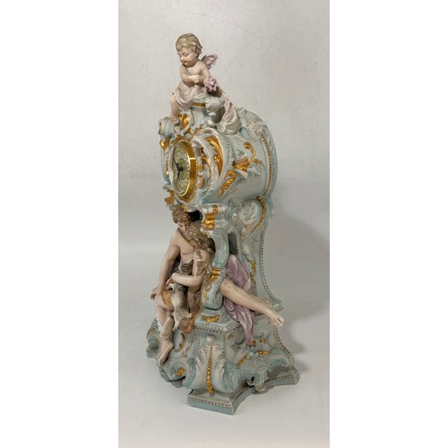 32 - Continental porcelain mantel clock.  Rococo style gilded details and figural sculptures.  Mercedes c... 