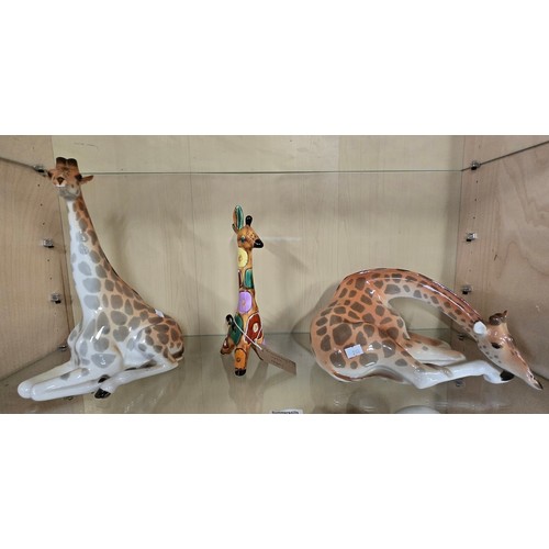 88 - Three Lomonosov Giraffe porcelain figurines