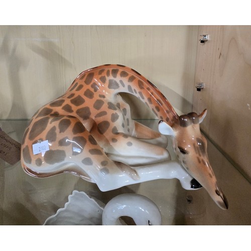88 - Three Lomonosov Giraffe porcelain figurines