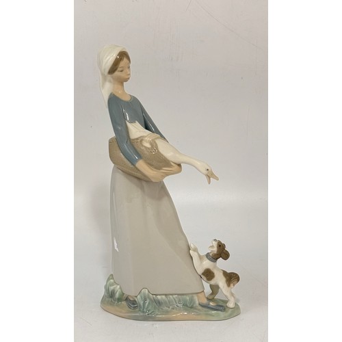 189 - A group of three Lladro figurines.  