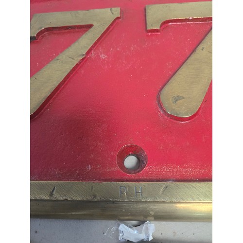 690 - Vintage sign with brass border and raised numbers 