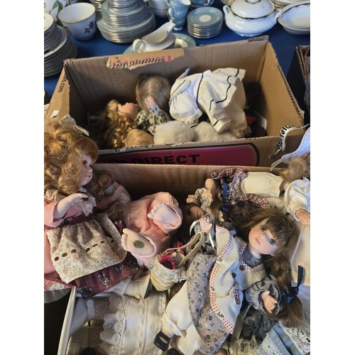 714 - Three boxes of various porcelain dolls