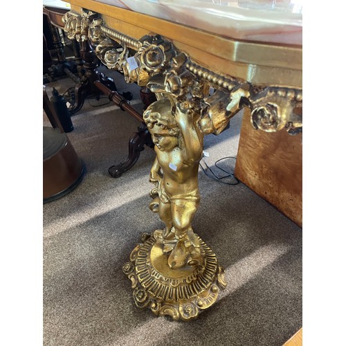 612 - A gilt and onyx console table, the support moulded as a cherub, 82.5cm, 30cm deep, 81cm high
