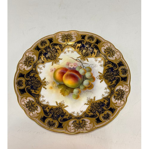 199 - Two Royal Worcester cabinet plates by R Sebright.  The first features a hand painted centre with pea... 