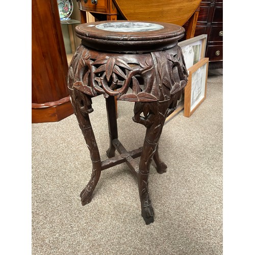 641 - A Chinese fruitwood stool/plant stand, formed as bamboo with marble inset top, 61cm high, 31cm wide