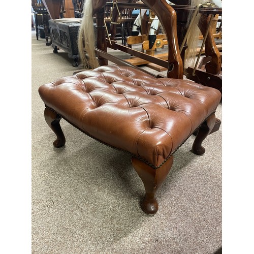 642 - A leather effect upholstered foot stool on cabriole legs, 58.6cm wide, 41cm deep 34cm high