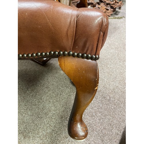 642 - A leather effect upholstered foot stool on cabriole legs, 58.6cm wide, 41cm deep 34cm high