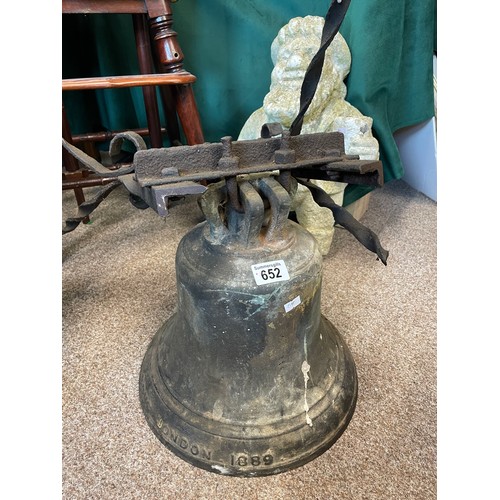 652 - A bronze bell with original fitting, stamped London 1889, 32cm high (excluding fitting)