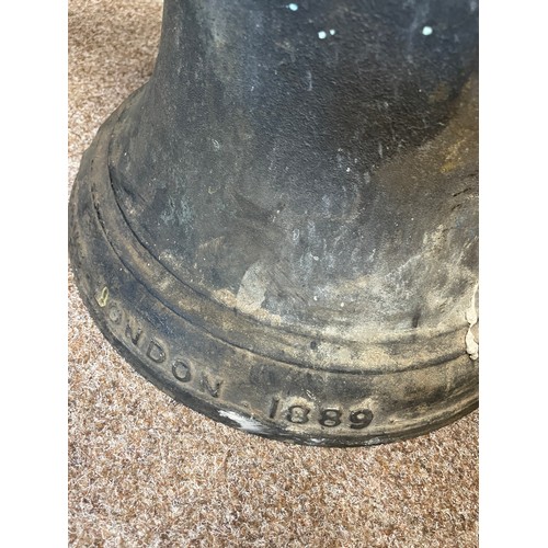 652 - A bronze bell with original fitting, stamped London 1889, 32cm high (excluding fitting)