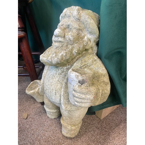 566 - A cast garden gnome, 45cm high