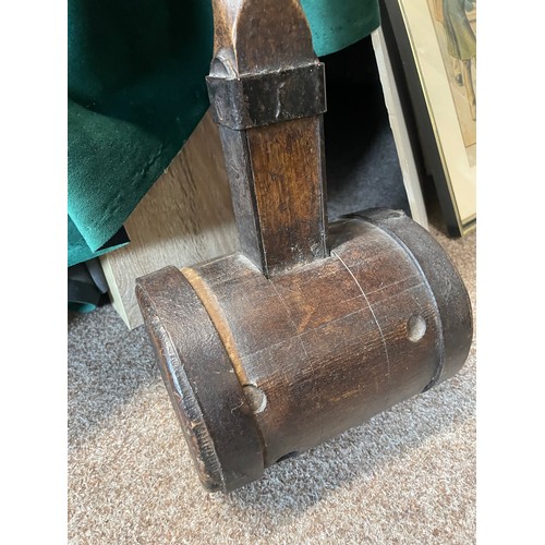 70 - A large 19th century wooden and metal bound mallet, 107cm high