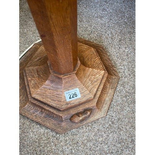 226 - A Robert (Mouseman) Thompson adzed oak standard lamp, with carved mouse, 144cm high