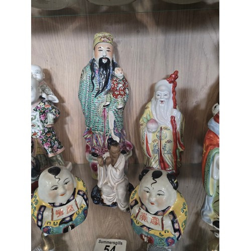 54 - A collection of Chinese porcelain figurines (12)