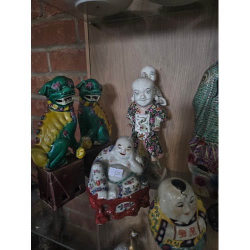 54 - A collection of Chinese porcelain figurines (12)