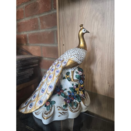55 - A Pair of Vintage Royal Crown Derby Peacocks H21cm plus Four vintage Yoshimi K porcelain foo dragon ... 