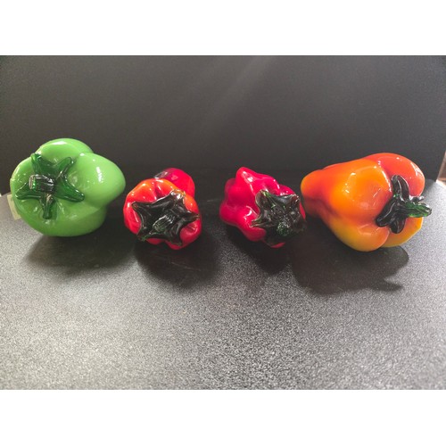111 - Four Murano glass peppers